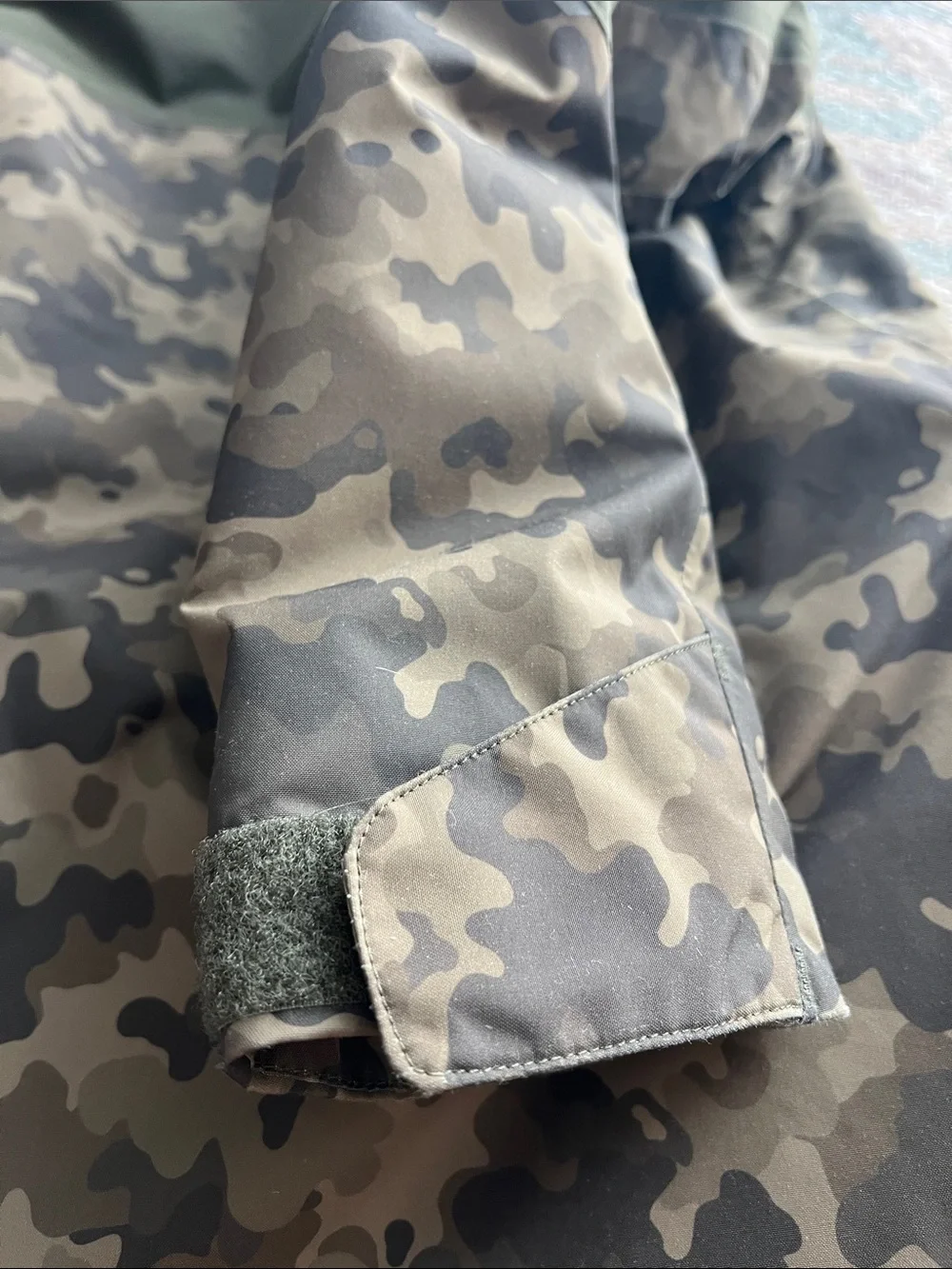 Helly Hansen Kids Olive Camo Jacket with Bright Orange Hood Trim